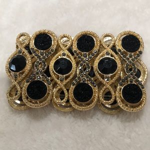 Gold and black bracelet no tags